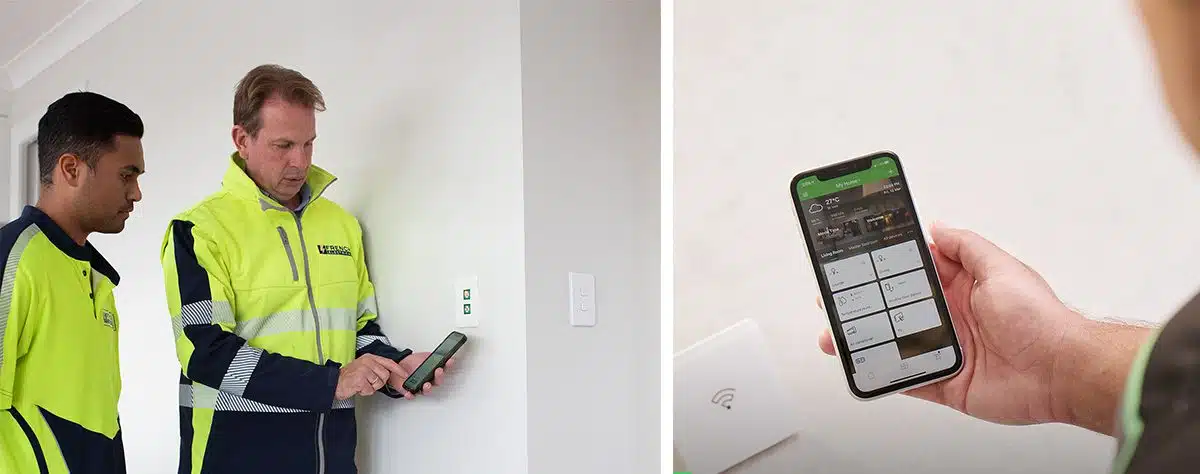 Electricians installing a home automation smart switch in an Auckland home