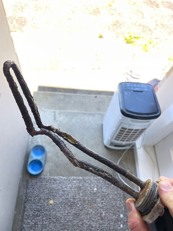burnt hot water cylinder element