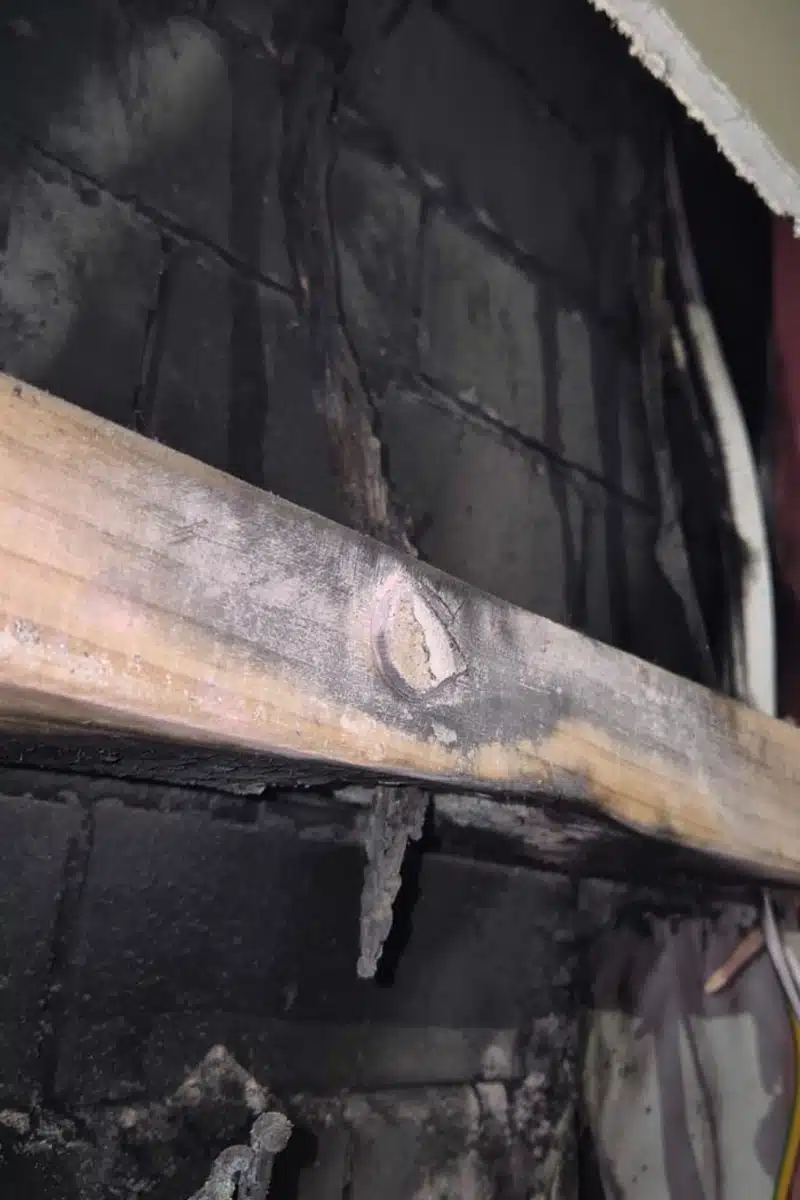 charred wood from faulty electrical wiring