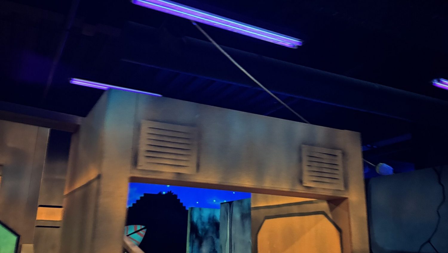 Electrical fit-out lighting installed in the laser tag corridor at Game On Takanini